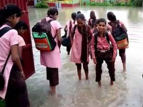 school flooded with water due to heavy rain in etawah school flooded with water due to heavy rain in etawah