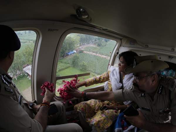 Uttar Pradesh govt spent Rs 14 lakh on chopper showered rose petals on kanwariyas Uttar Pradesh govt spent Rs 14 lakh on chopper showered rose petals on kanwariyas