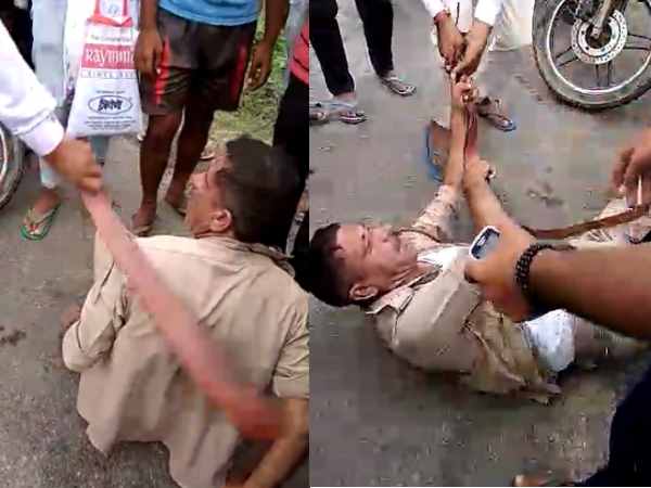 Viral Video Public beats police constable in bulandshahr Viral Video Public beats police constable in bulandshahr