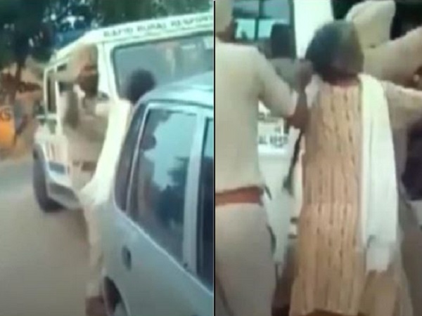 Punjab policeman thrashing elderly woman, dragging her by her hair publicly Punjab policeman thrashing elderly woman, dragging her by her hair publicly