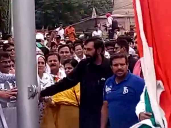 flag hoisted by the parents of Shaheed Aurangzeb flag hoisted by the parents of Shaheed Aurangzeb