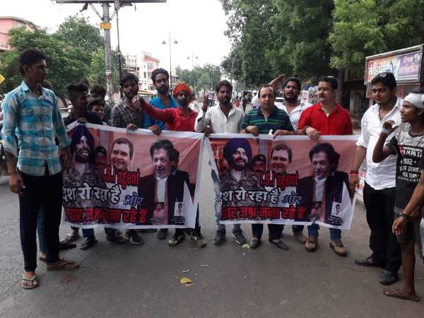 bjp yuva morcha project navjot singh siddhu as pak army chief and rahul as isi agent bjp yuva morcha project navjot singh siddhu as pak army chief and rahul as isi agent