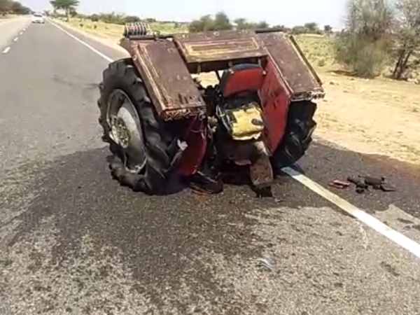 Two pieces of tractor made in road accident Two pieces of tractor made in road accident