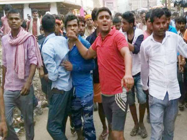 FIR against 360 for parading woman naked, 15 arrested FIR against 360 for parading woman naked, 15 arrested