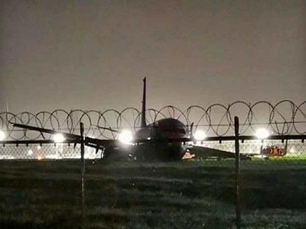 chinese boeing 737 slides at manila airport due to heavy rain chinese boeing 737 slides at manila airport due to heavy rain