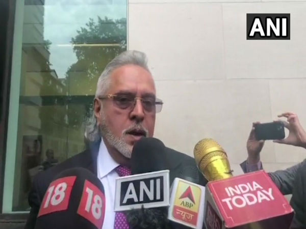 WATCH: Vijay Mallya outside London Court clarifies on his statement that he met Finance Minister before leaving from the country WATCH: Vijay Mallya outside London Court clarifies on his statement that he met Finance Minister before leaving from the country