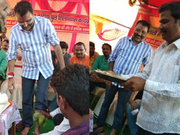 निशिकांत दुबे ने भाजपा कार्यकर्ता से धुलवाए पैर