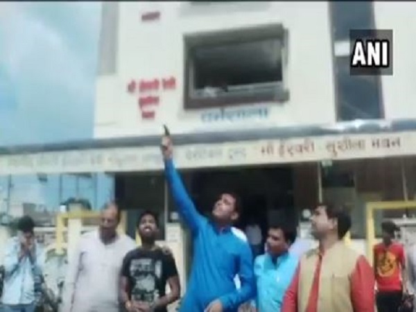 BJP leader Rahul Rajput fires celebratory shots during his birthday celebrations in Bhopal BJP leader Rahul Rajput fires celebratory shots during his birthday celebrations in Bhopal