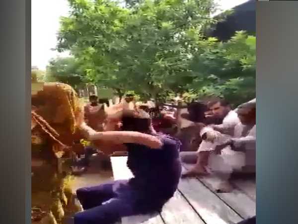 soilder wife beat two boys with slippers in front of panchayat soilder wife beat two boys with slippers in front of panchayat
