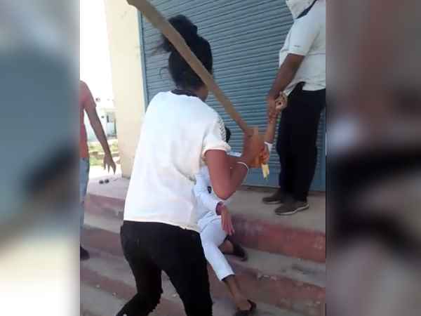 Girl beating young man in Bharatpur viral video Girl beating young man in Bharatpur viral video