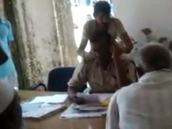 Bihar police ASI suspended after getting massage on duty video goes viral Bihar police ASI suspended after getting massage on duty video goes viral