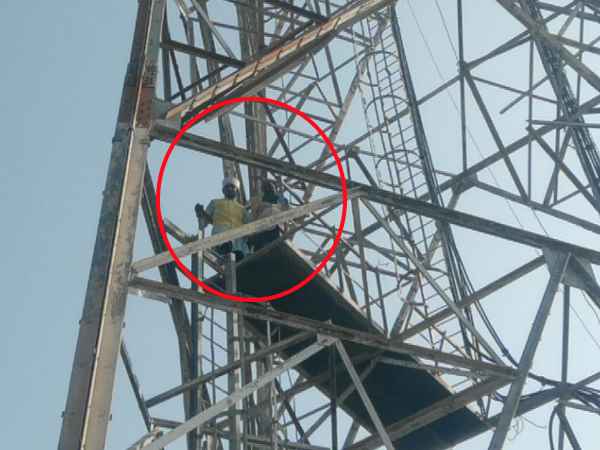 Two young men climb on the mobile tower in Shahjahanpur Two young men climb on the mobile tower in Shahjahanpur