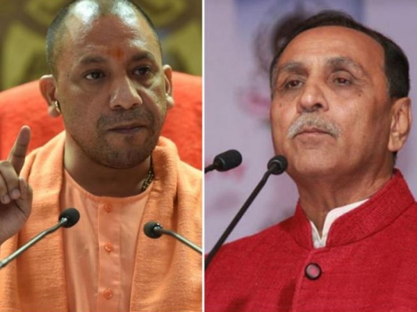 up cm yogi adityanath speaks with vijay rupani over attacks on UP & Bihar people in Gujarat up cm yogi adityanath speaks with vijay rupani over attacks on UP & Bihar people in Gujarat