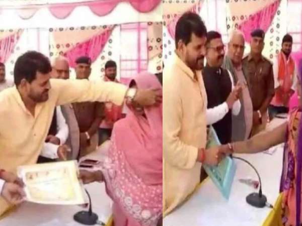 BJP MP Brijbhushan Sharan Singh removed veil of women during distributing certificates BJP MP Brijbhushan Sharan Singh removed veil of women during distributing certificates