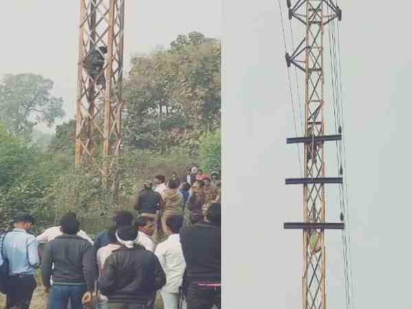 husband with his baby climbs on the tower seeks to call her wife in agra husband with his baby climbs on the tower seeks to call her wife in agra