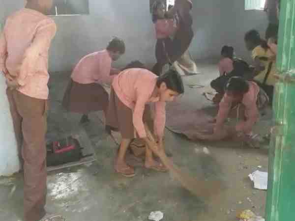 small children cleaning classroom with broom in farrukhabad school small children cleaning classroom with broom in farrukhabad school