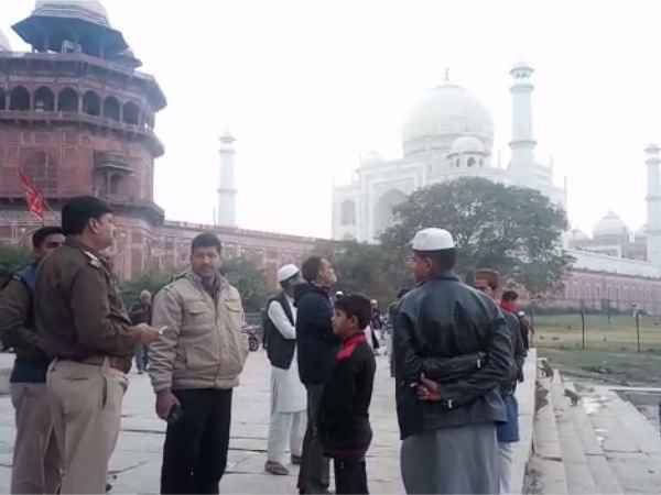 tourists fly the drone camera over the Taj Mahal in Agra tourists fly the drone camera over the Taj Mahal in Agra