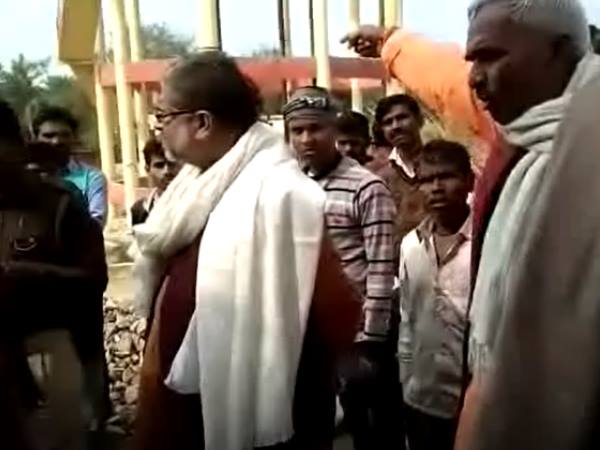 bjp mla surendra singh hoisted road by jcb in ballia bjp mla surendra singh hoisted road by jcb in ballia