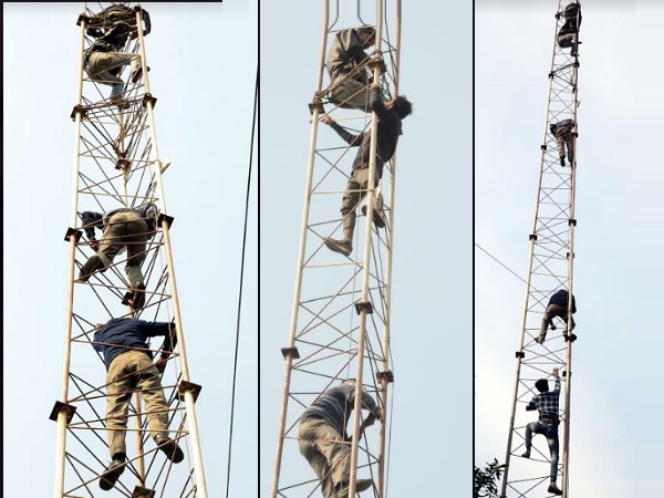 when sweepers lose their job, moved to protest and climbed on the tower in noida when sweepers lose their job, moved to protest and climbed on the tower in noida