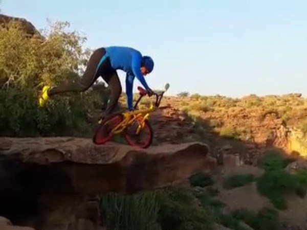 Rajasthans 69 year old man Doing Yoga on 300 feet high hill on a bicycle Rajasthans 69 year old man Doing Yoga on 300 feet high hill on a bicycle