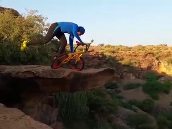 69 year old man Doing Yoga on 300 feet high hill on a bicycle 69 year old man Doing Yoga on 300 feet high hill on a bicycle
