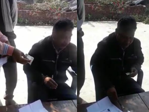 एक फॉर्म भरने का सौ रुपए ले रहा था लेखपाल