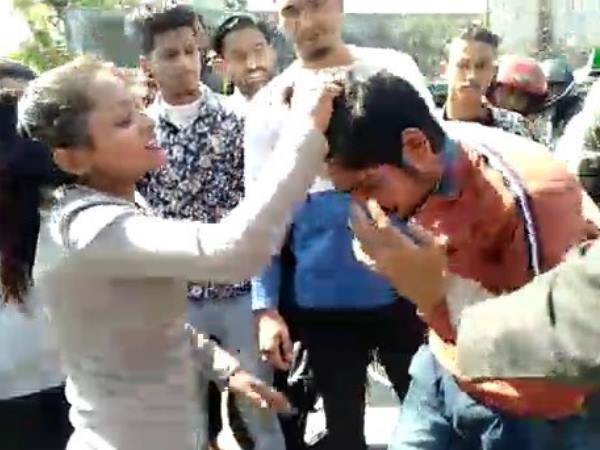 eve teaser beaten up by girl on road eve teaser beaten up by girl on road