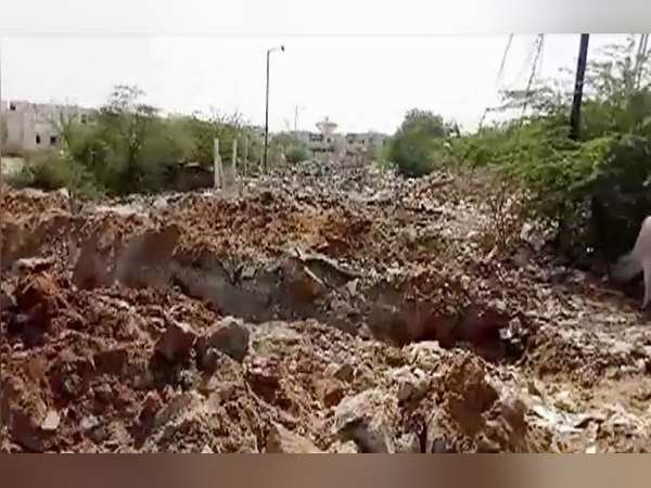 Gujarat: private builder destroys a road at Deesa Nagar Palika area Gujarat: private builder destroys a road at Deesa Nagar Palika area