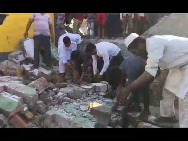 two children died after wall collapse during unloading of sand from truck two children died after wall collapse during unloading of sand from truck