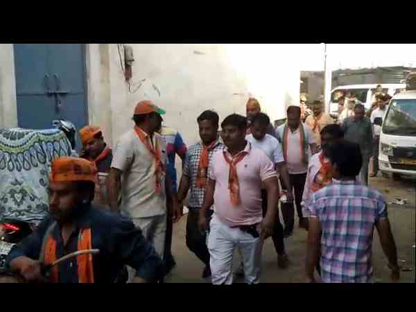 BJP supporter with pistol during election campaign BJP supporter with pistol during election campaign