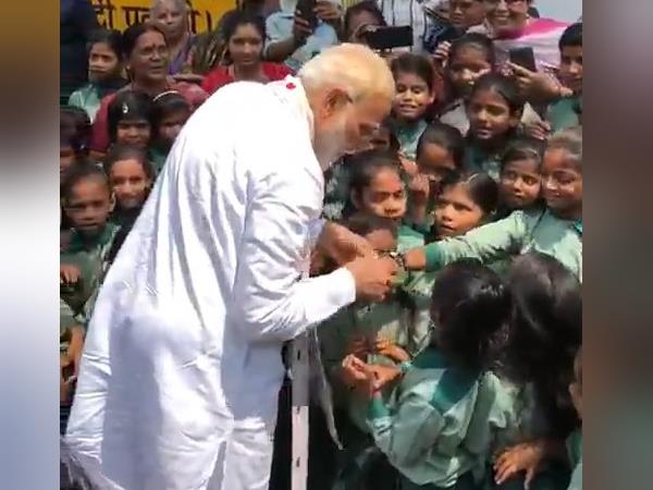 pm narendra modi listen patriotic song from students in varanasi pm narendra modi listen patriotic song from students in varanasi