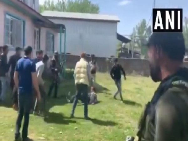 PDP supporters thrash a NC polling agent at Bijbehara polling station in Anantnag PDP supporters thrash a NC polling agent at Bijbehara polling station in Anantnag