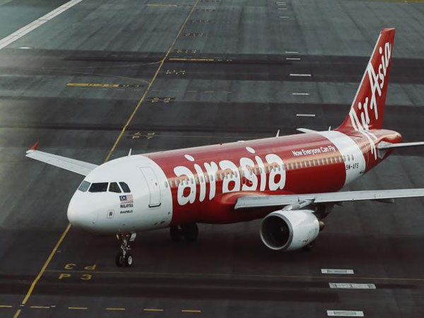 Air Asia flight cordoned off by CISF at Kolkata airport after threat call received Air Asia flight cordoned off by CISF at Kolkata airport after threat call received