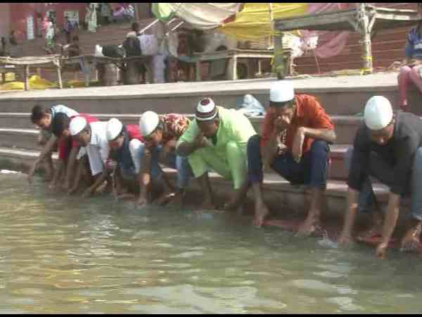 Before namaz muslim brothers come to ganga river Before namaz muslim brothers come to ganga river