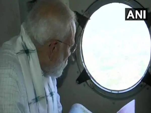 Cyclone Fani: PM Modi conducts aerial survey of affected areas in Odisha CM Naveen Patnaik also present Cyclone Fani: PM Modi conducts aerial survey of affected areas in Odisha CM Naveen Patnaik also present