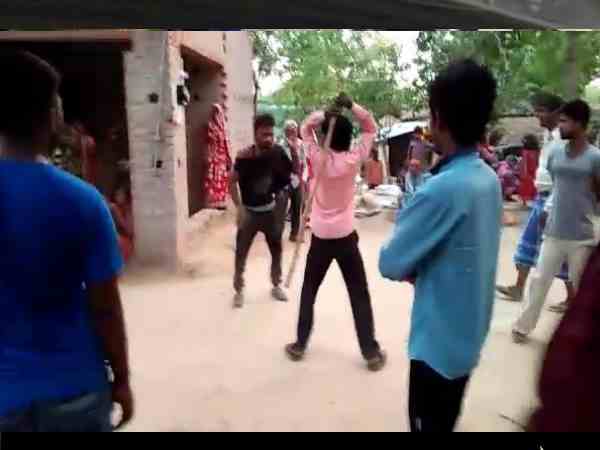 devrani and her lover beaten badly with sticks by the people devrani and her lover beaten badly with sticks by the people