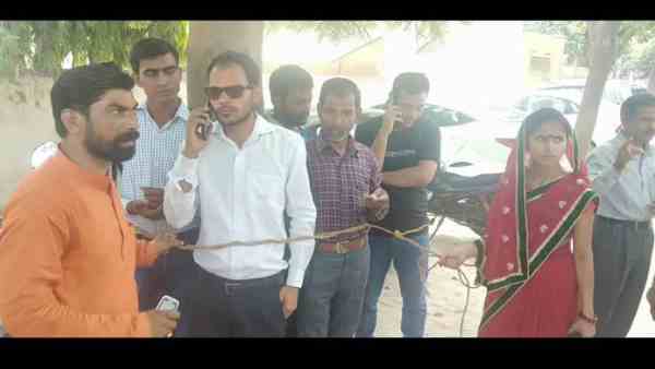 woman councilor tied 8 man with the tree woman councilor tied 8 man with the tree