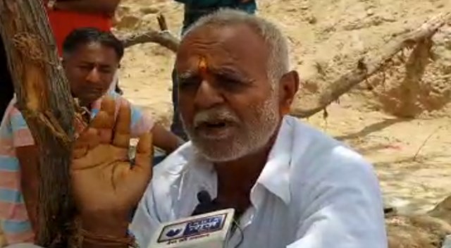Rituals : Barmer Child sat as a frog to pray for rain Rituals : Barmer Child sat as a frog to pray for rain