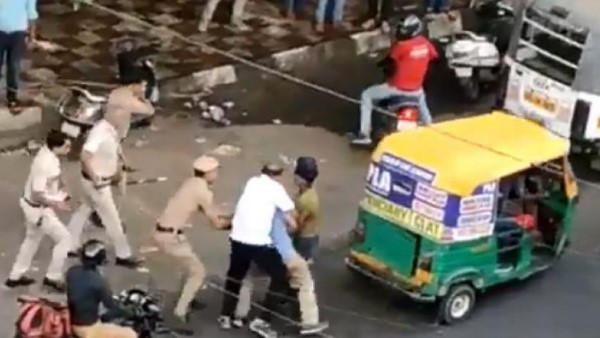 MHA seeks report from Commissioner of Police Delhi after videos of policemen thrashing a driver MHA seeks report from Commissioner of Police Delhi after videos of policemen thrashing a driver