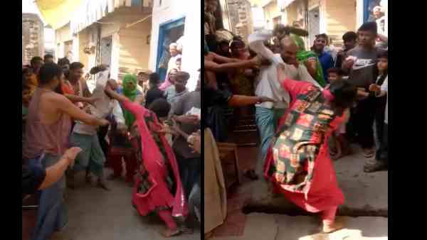Man beats woman with slipper, video goes viral Man beats woman with slipper, video goes viral