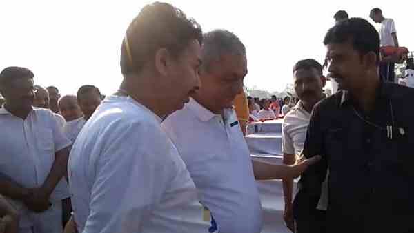 minister laxmi narayan chaudhary shoes tied by a government employee minister laxmi narayan chaudhary shoes tied by a government employee