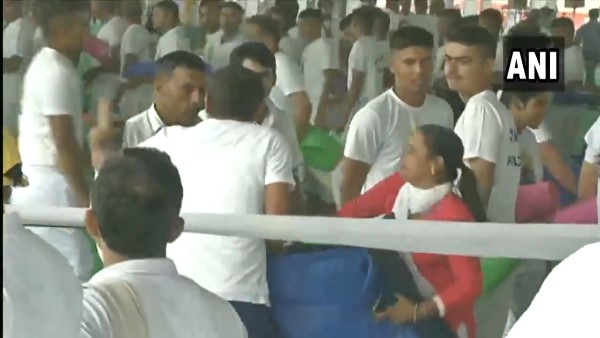 pandemonium broke out in Rohtak after people looted yoga mats from the venue Amit Shah pandemonium broke out in Rohtak after people looted yoga mats from the venue Amit Shah