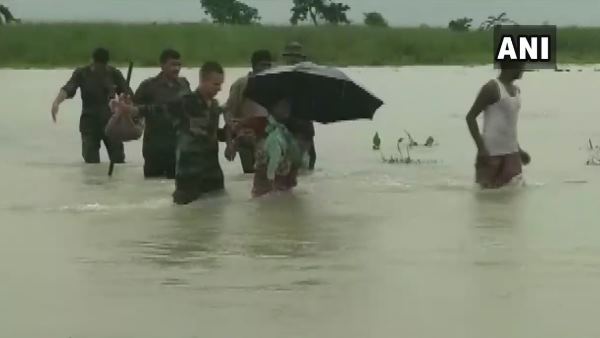 six died in assam flood, army called for rescue mission six died in assam flood, army called for rescue mission