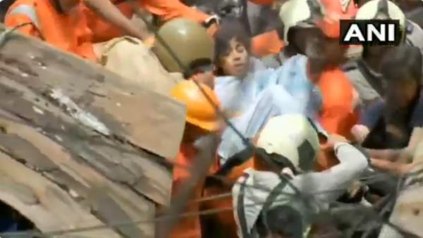 Mumbai building collapse dongri woman rescued by NDRF personne video Mumbai building collapse dongri woman rescued by NDRF personne video