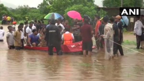 NDRF working to save stuck passengers of mahalaxmi express NDRF working to save stuck passengers of mahalaxmi express