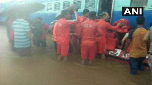 NDRF working to save stuck passengers of mahalaxmi express NDRF working to save stuck passengers of mahalaxmi express