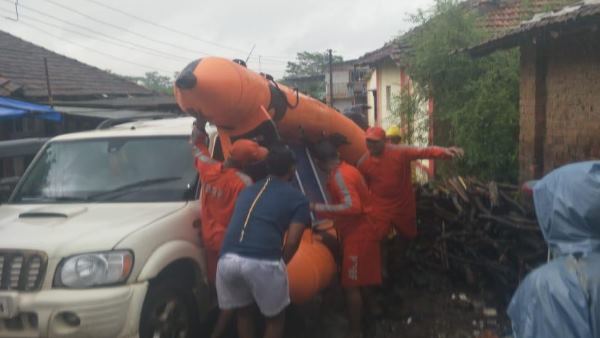 NDRF working to save stuck passengers of mahalaxmi express NDRF working to save stuck passengers of mahalaxmi express