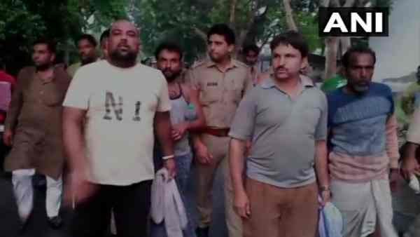 Police conducted a raid at an illegal slaughterhouse & arrested 12 people Police conducted a raid at an illegal slaughterhouse & arrested 12 people