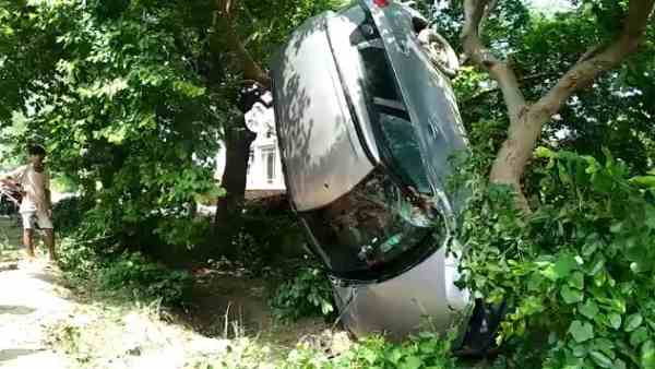 car hit and hang on the tree car hit and hang on the tree