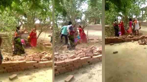 watch, bjp leader fights while women beating with sticks watch, bjp leader fights while women beating with sticks